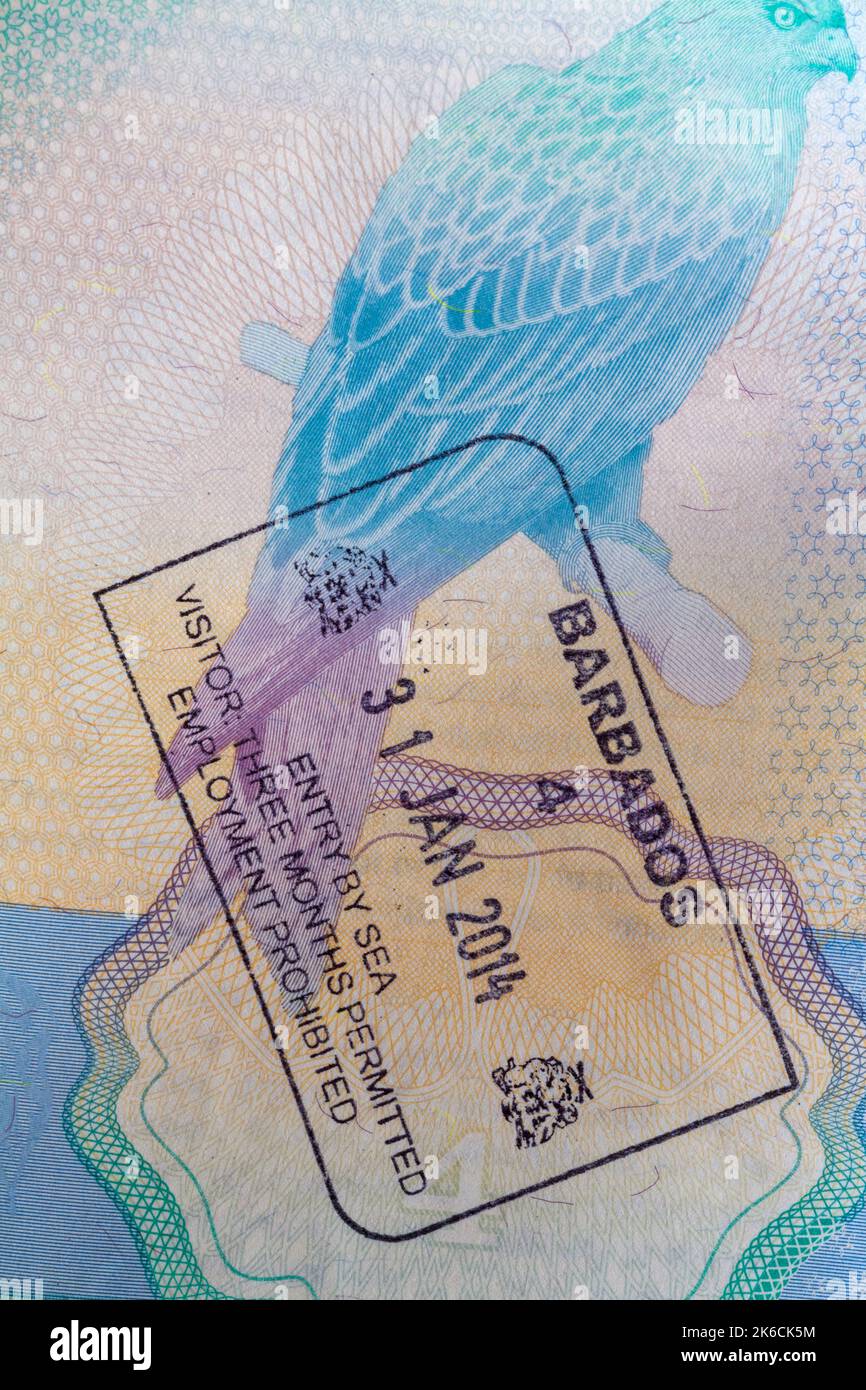 Barbados entry by sea visitor three months permitted employment prohibited stamp in British passport  31 Jan 2014 Stock Photo