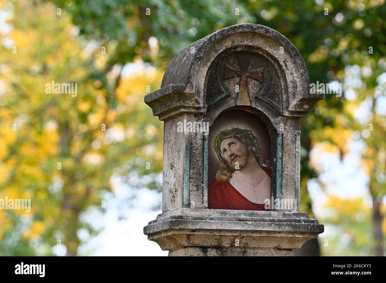 Vienna, Austria. The Central Cemetery in Vienna. Tombstone with image of Jesus Stock Photo
