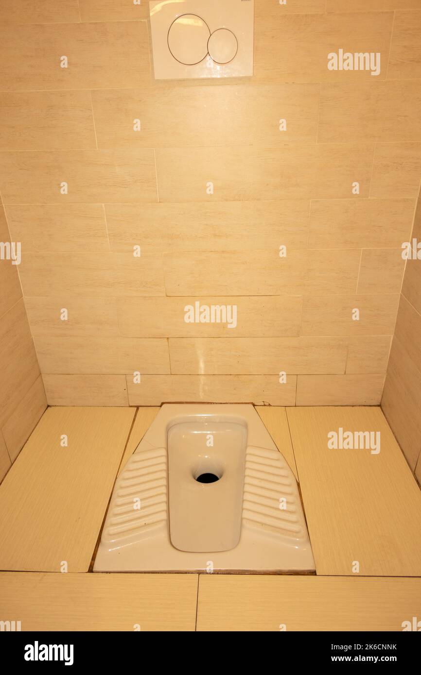 Squat public toilet in Porto Cervo Sardina Italy Stock Photo