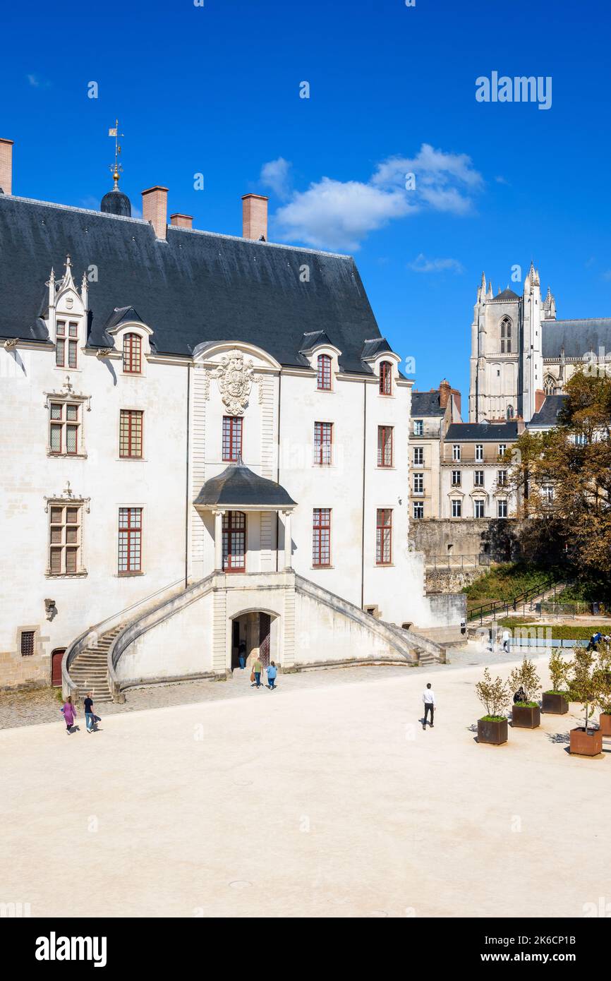 The Grand Gouvernement building in the Castle of the Dukes of Brittany in Nantes, France, with the Cathedral in the distance. Stock Photo