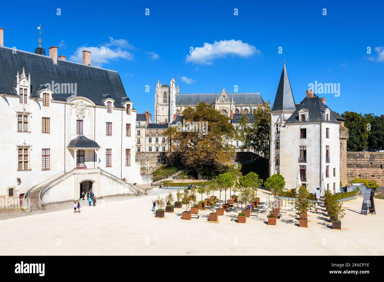 General view of the Château des Ducs de Bretagne (Castle of the Dukes of Brittany) in Nantes, France, with the Cathedral in the distance. Stock Photo