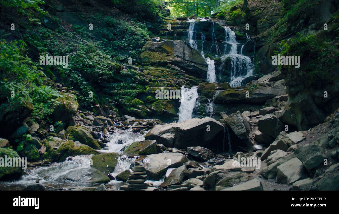 Clear water flowing down mossy hi-res stock photography and images - Alamy
