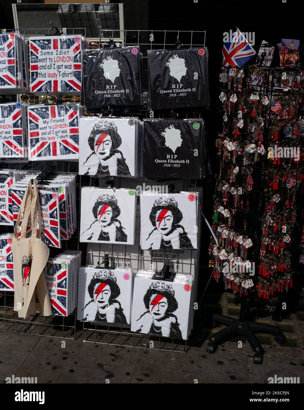 T-Shirt merchandise of the Late Queen in a London tourism shop on the first day of the Queens period of lying in state at the Place of Westminster. Stock Photo