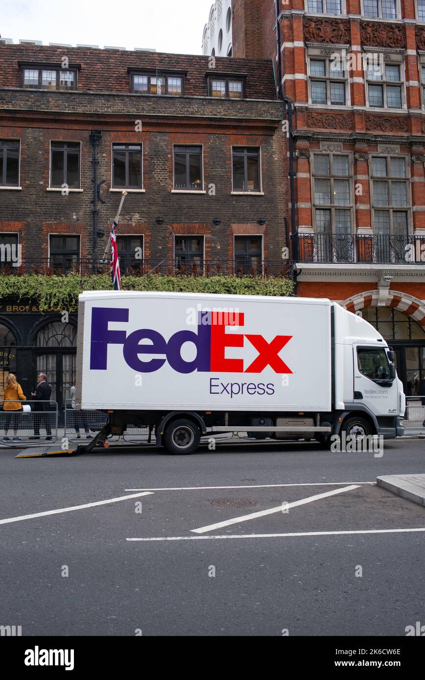 A FedEx express lorry unloads on St James Street London UK Stock Photo
