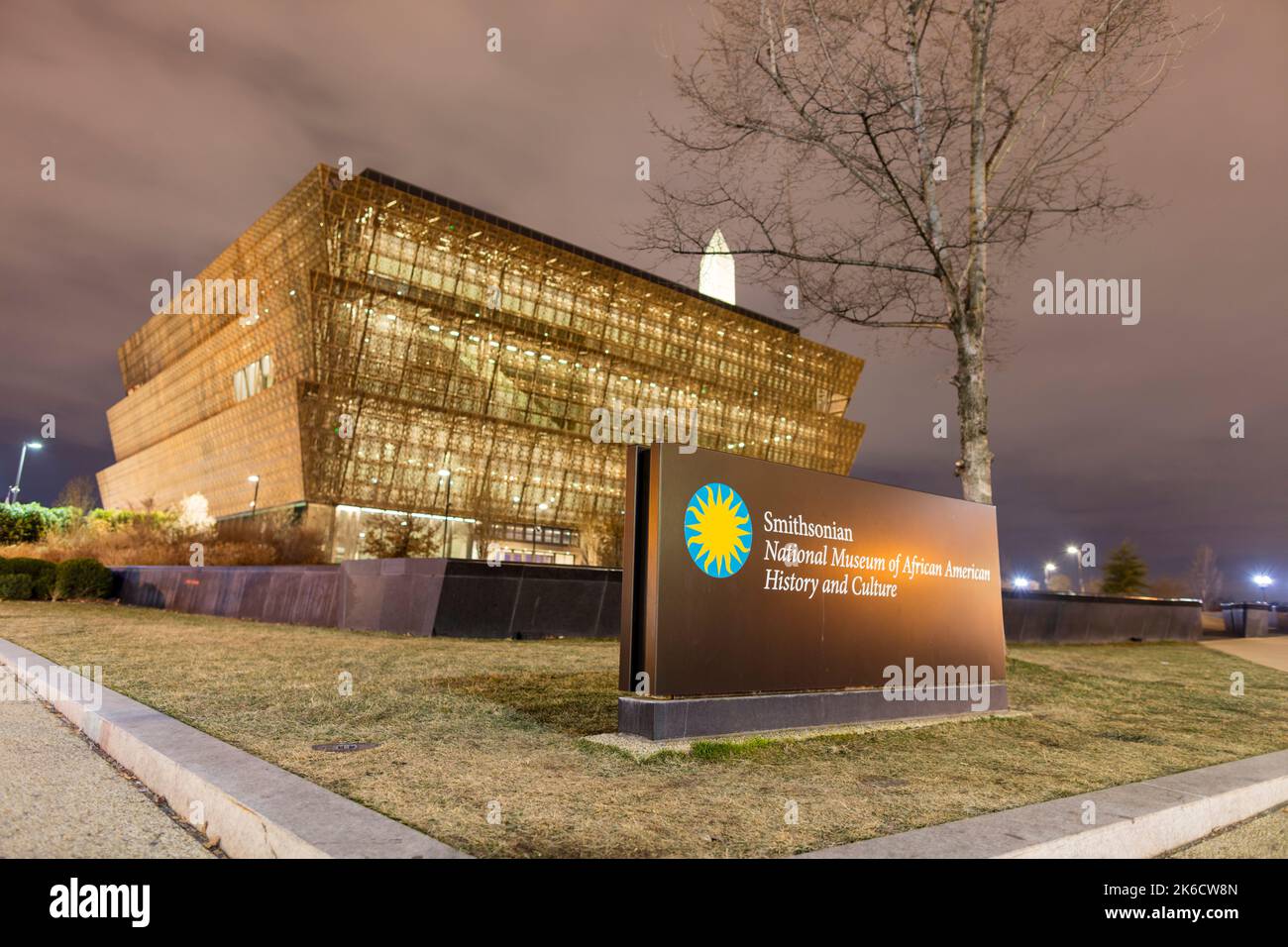 A sign for the Smithsonian National Museum of African American History and Culture seen on a winter evening. Stock Photo