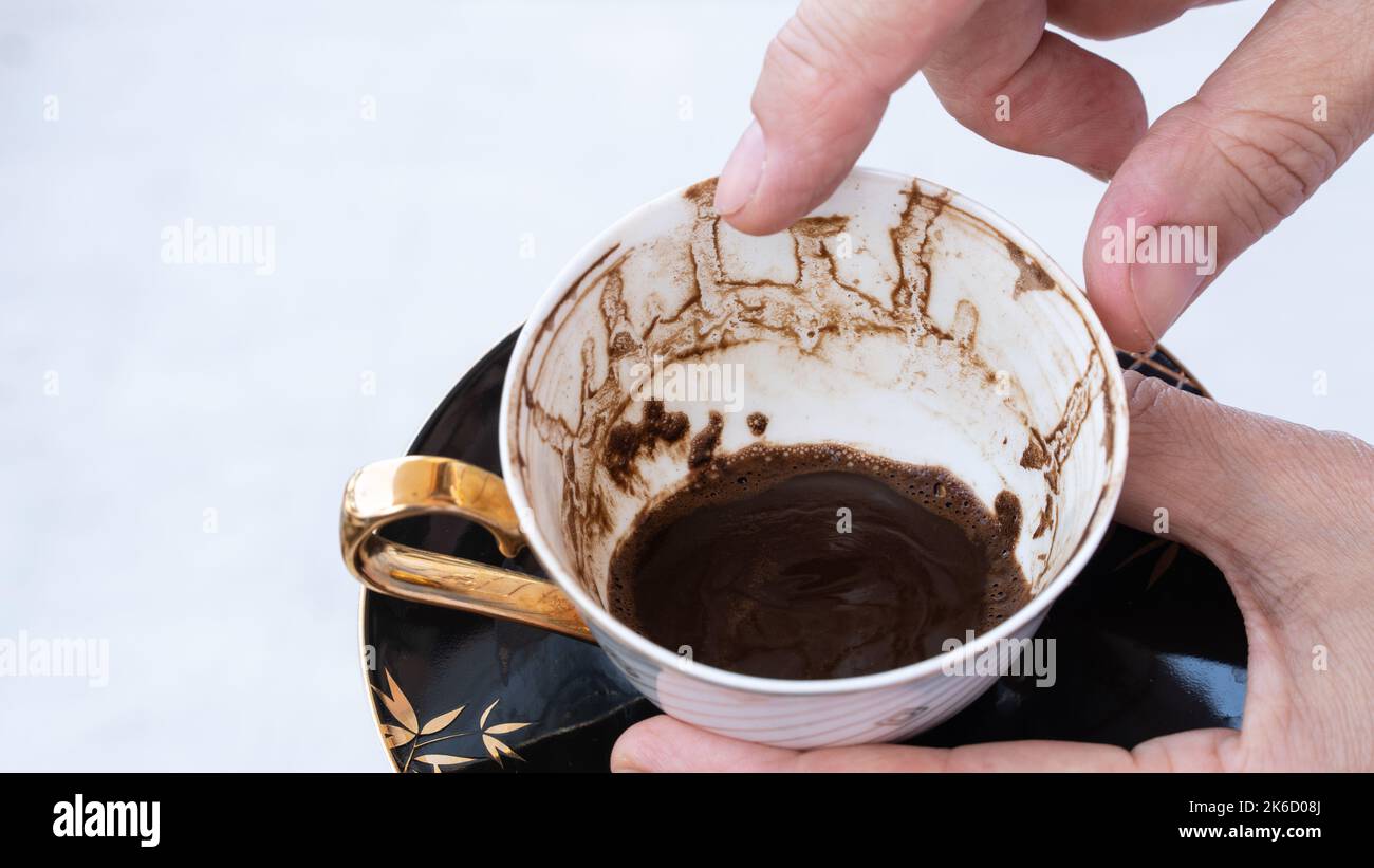 Fortune telling with coffee. Woman fortune teller predicting the future
