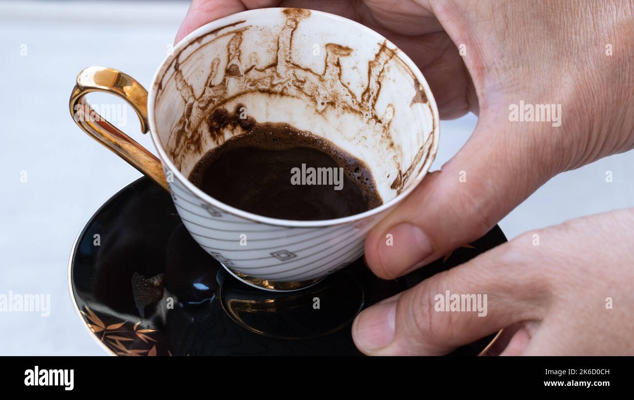 Fortune telling with coffee. Woman fortune teller predicting the future