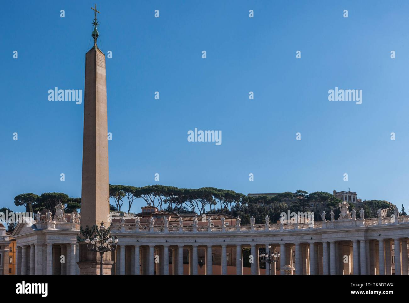 Vatican City, Vatican - February 10, 2013: The obelisk in St Peter's Square and the Bernini's Colonnade. Stock Photo