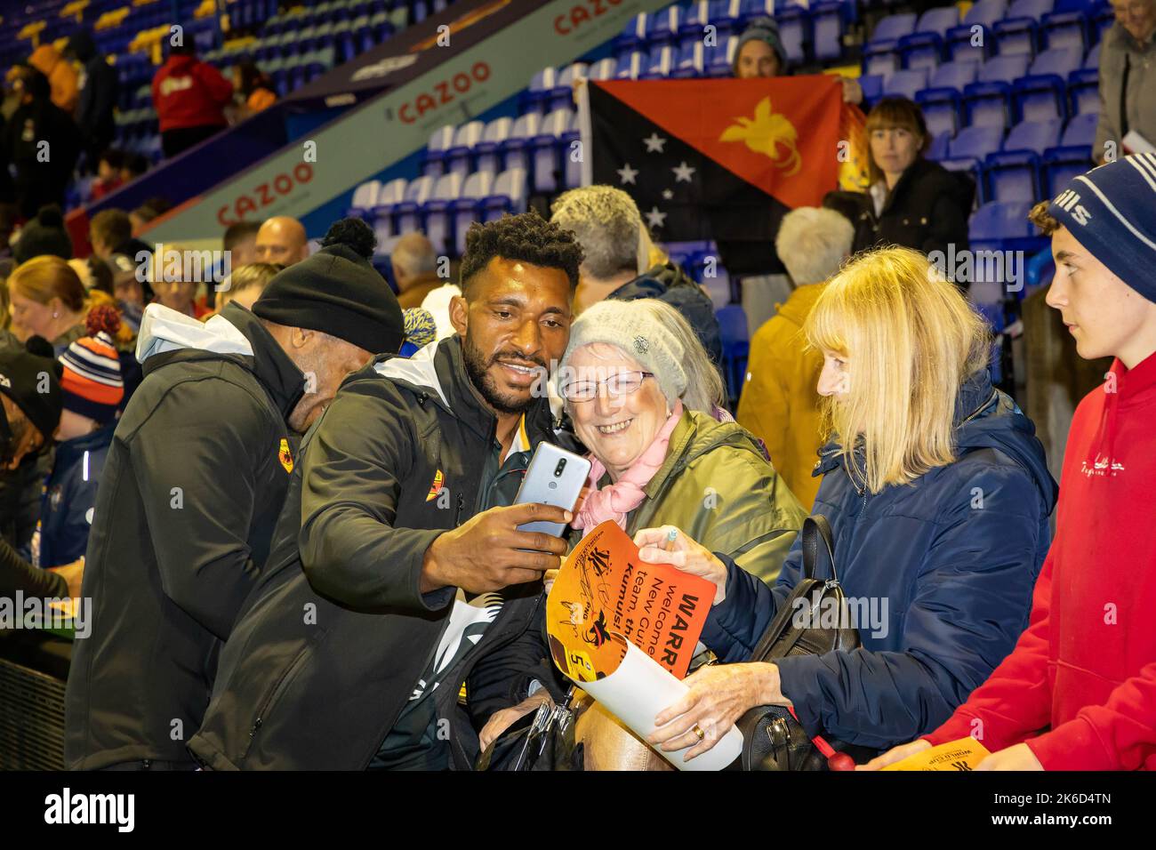 A player from the Papua New Guinea Rugby League squad takes a selfie