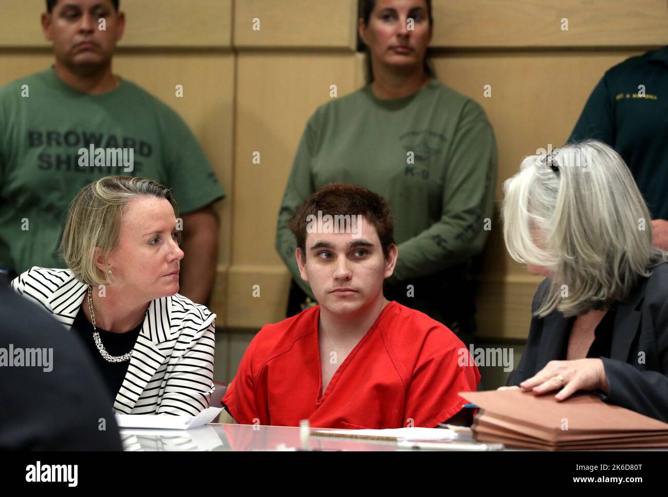 Ft. Lauderdale, USA. 15th Aug, 2018. Nikolas Cruz speaks with his attorneys, public defenders Melisa McNeill, left, and Diane Cuddihy during a status check on his case at the Broward County Courthouse in Fort Lauderdale, Fla. on Wednesday, Aug. 15, 2018. (Photo by Amy Beth Bennett/Sun Sentinel/TNS/Sipa USA) Credit: Sipa USA/Alamy Live News Stock Photo