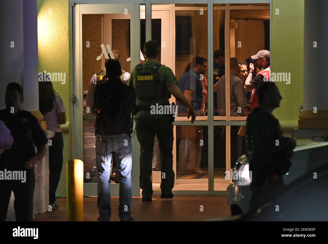 Parkland, USA. 14th Feb, 2018. Parents meet at the Fort Lauderdale Marriott Coral Springs Hotel to pick up their children following a mass shooting at nearby Marjory Stoneman Douglas High School in Parkland, Fla., on Wednesday, Feb. 14, 2018. (Photo by Jim Rassol/Sun Sentinel/TNS/Sipa USA) Credit: Sipa USA/Alamy Live News Stock Photo
