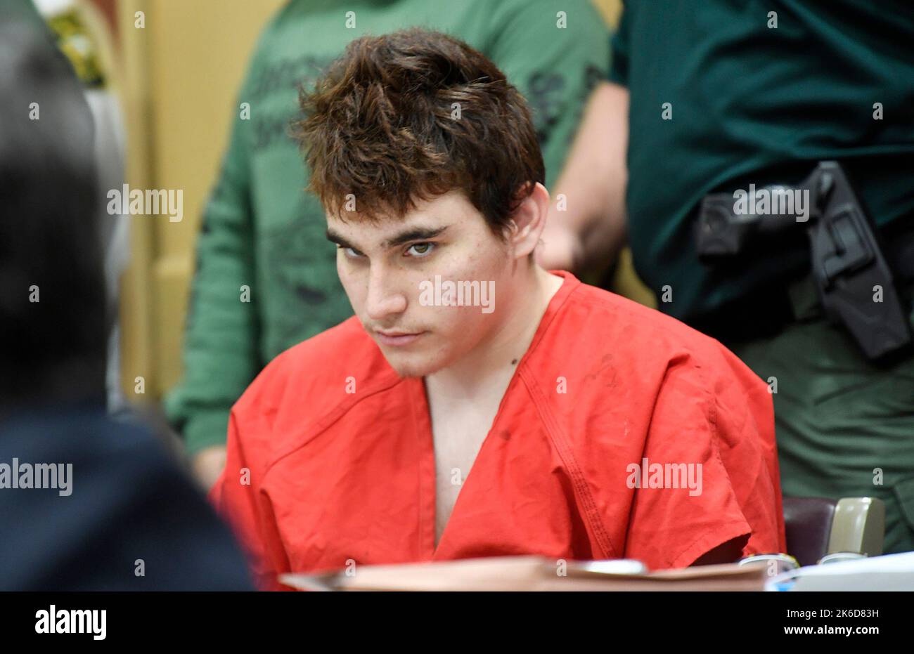 Fort Lauderdale, USA. 27th Apr, 2018. Florida school shooting suspect Nikolas Cruz quickly glances up at the prosecutors while in court before Circuit Judge Elizabeth Scherer for a hearing to move forward the death penalty case on April 27, 2018, in Fort Lauderdale, Fla. (Photo by Taimy ALvarez/Sun Sentinel/TNS/Sipa USA) Credit: Sipa USA/Alamy Live News Stock Photo