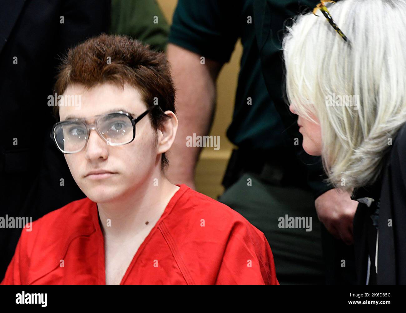 Fort Lauderdale, USA. 22nd Mar, 2019. Parkland school shooter Nikolas Cruz listens to his public defender Diane Cuddihy, right, during a hearing on police body-camera footage at the Broward Courthouse Friday, March 22, 2019 in Fort Lauderdale, Fla. (Photo by Taimy Alvarez/Sun Sentinel/TNS/Sipa USA) Credit: Sipa USA/Alamy Live News Stock Photo