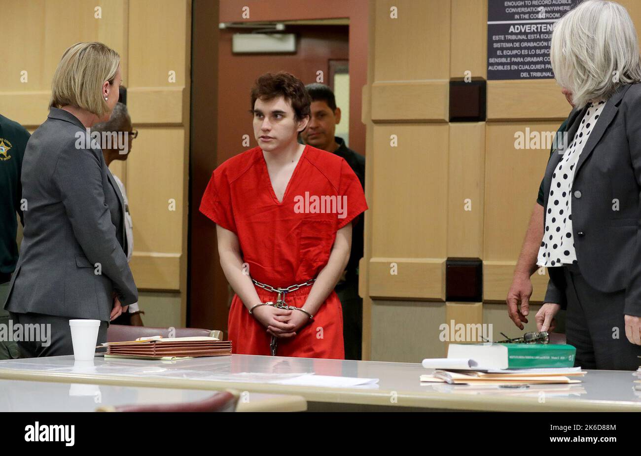 Fort Lauderdale, USA. 01st May, 2019. Parkland school shooting suspect Nikolas Cruz in court at the Broward Courthouse in Fort Lauderdale, Fla. on Wednesday, May 1, 2019 for a motion filed by the Public Defender's Office to withdraw from the case due to Cruz receiving an inheritance that can be used to pay for a private attorney. Defense attorney Melisa McNeill and Diane Cuddihy greet their client as he enters the courtroom. (Photo by Mike Stocker/South Florida Sun-Sentinel/TNS/Sipa USA) Credit: Sipa USA/Alamy Live News Stock Photo