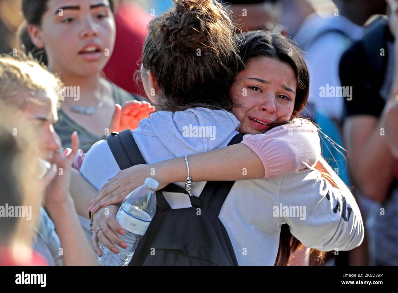 Parkland, USA. 14th Feb, 2018. Students are released from a lockdown outside of Stoneman Douglas High School in Parkland, Fla., after a shooting on Wednesday, Feb. 14, 2018. (Photo by John McCall/Sun Sentinel/TNS/Sipa USA) Credit: Sipa USA/Alamy Live News Stock Photo