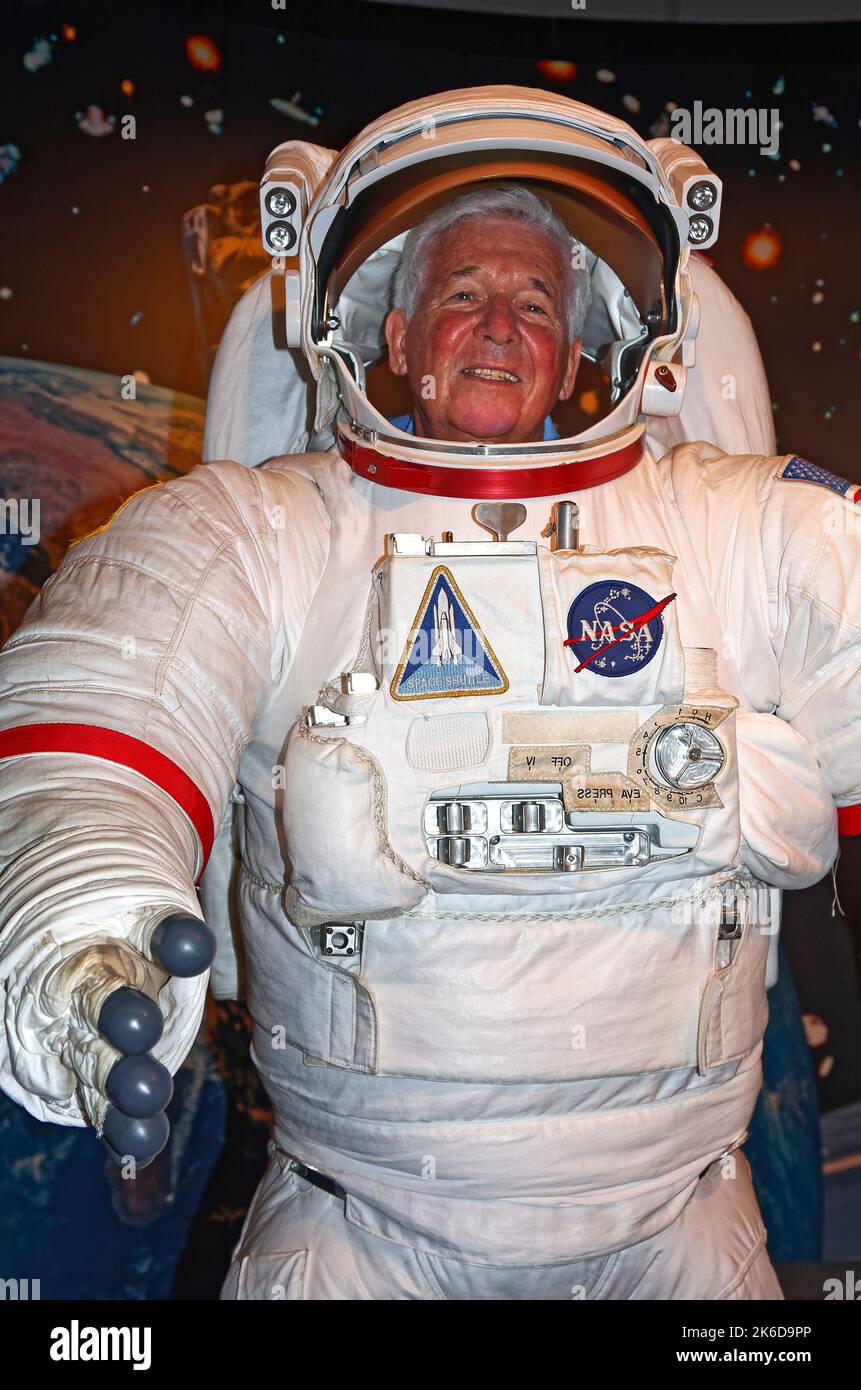 NASA space suit, visitor inside, shuttle, white, display, 1981-2011, Extravehicular Mobility Unit, EMU, contains DuPont inventions, Hagley Museum, Del Stock Photo