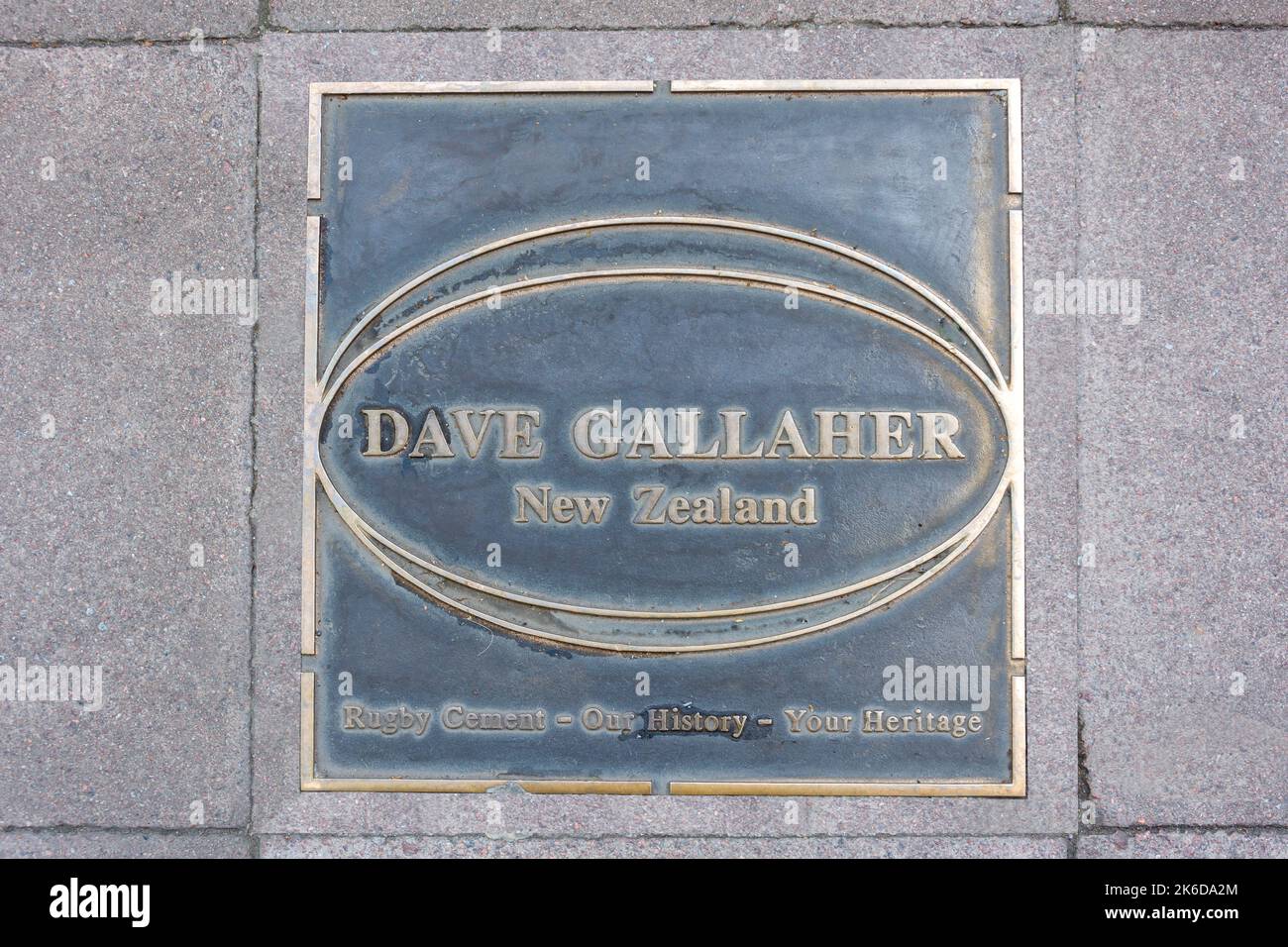 Rugby player (Dave Gallaher, New Zealand) pavement plaque, Regent Street, Rugby, Warwickshire, England, United Kingdom Stock Photo