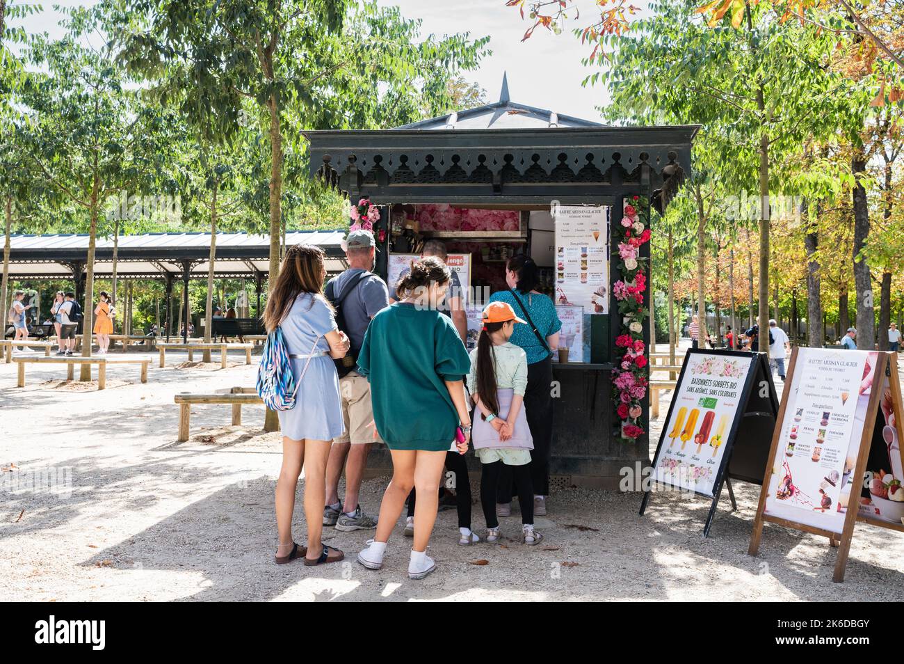 Paris, France - August 27 2022: Ice cream and coffee kiosk in Luxembourg Gardens located between Saint-Germain and Latin Quarter in Paris. People queueing for ice lollies and drinks Stock Photo