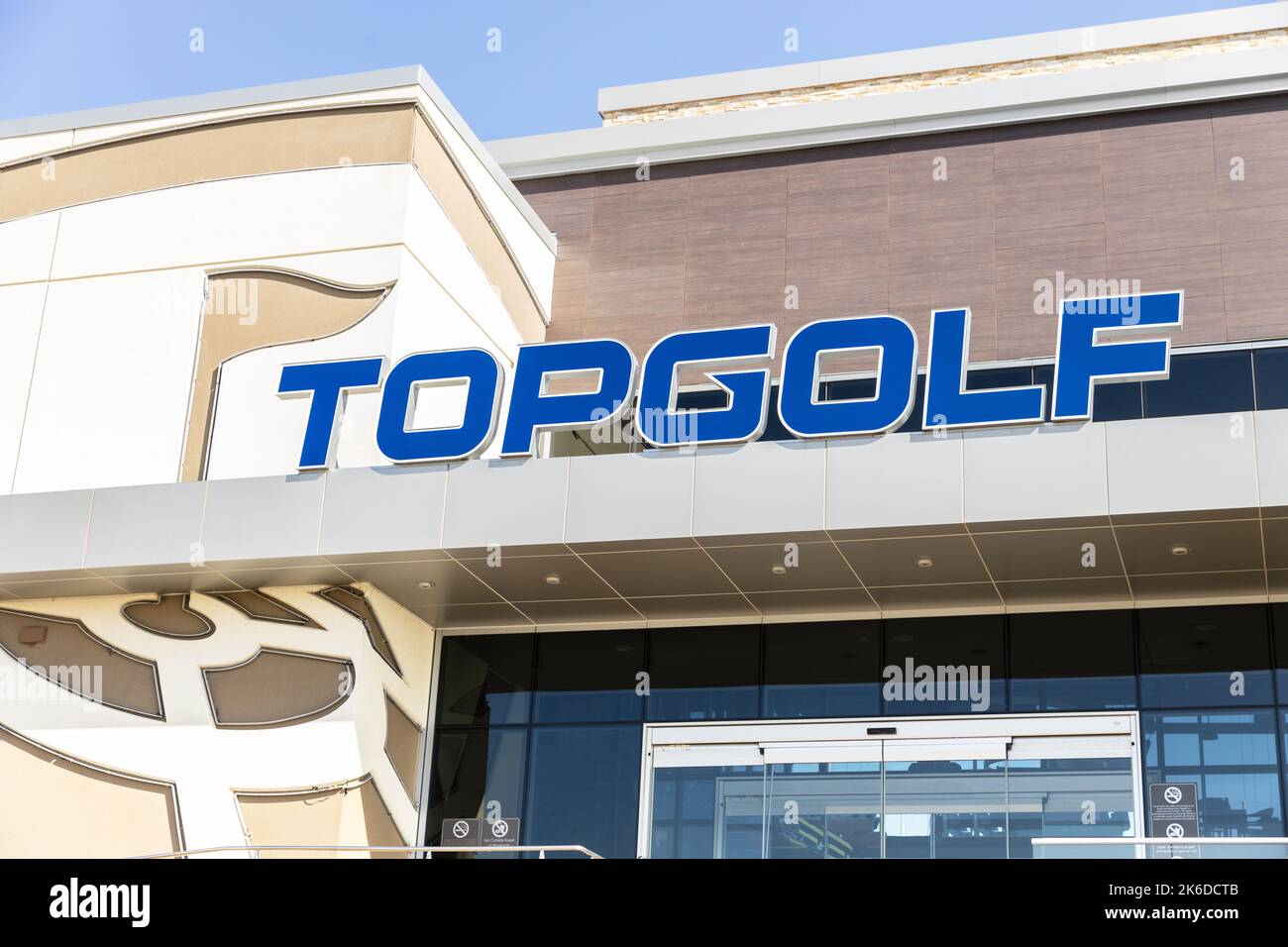 Topgolf features three floors of driving range bays and is a fun entertainment complex for all ages to enjoy. Stock Photo