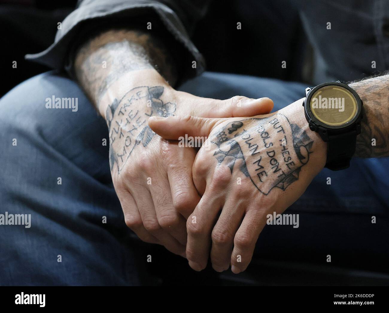 Tattooed police officer hi-res stock photography and images - Alamy