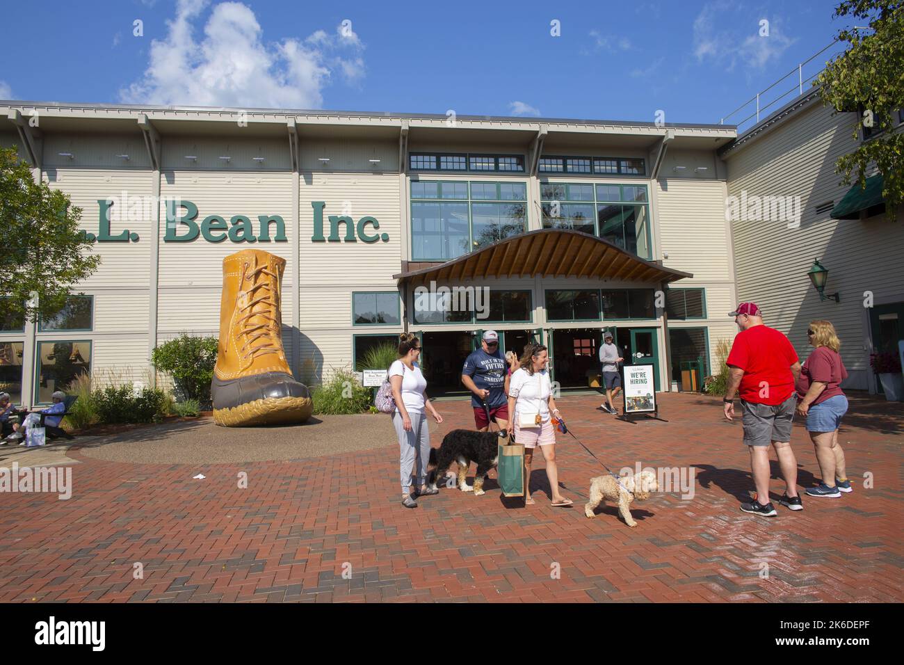 Shoppers leave the flagship LL Bean store in Freeport, Maine in