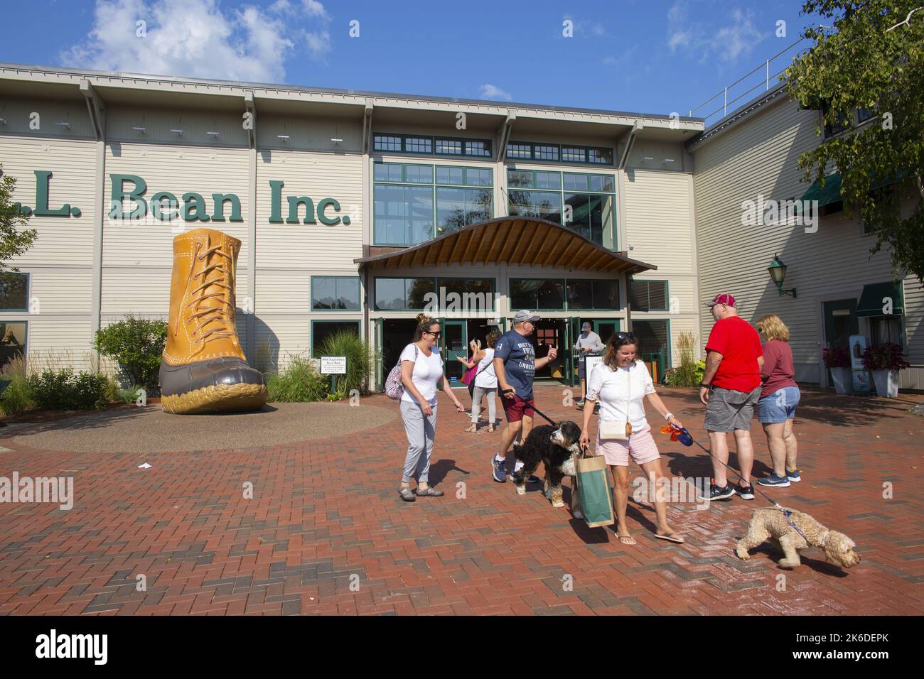 Shoppers leave the flagship LL Bean store in Freeport, Maine in