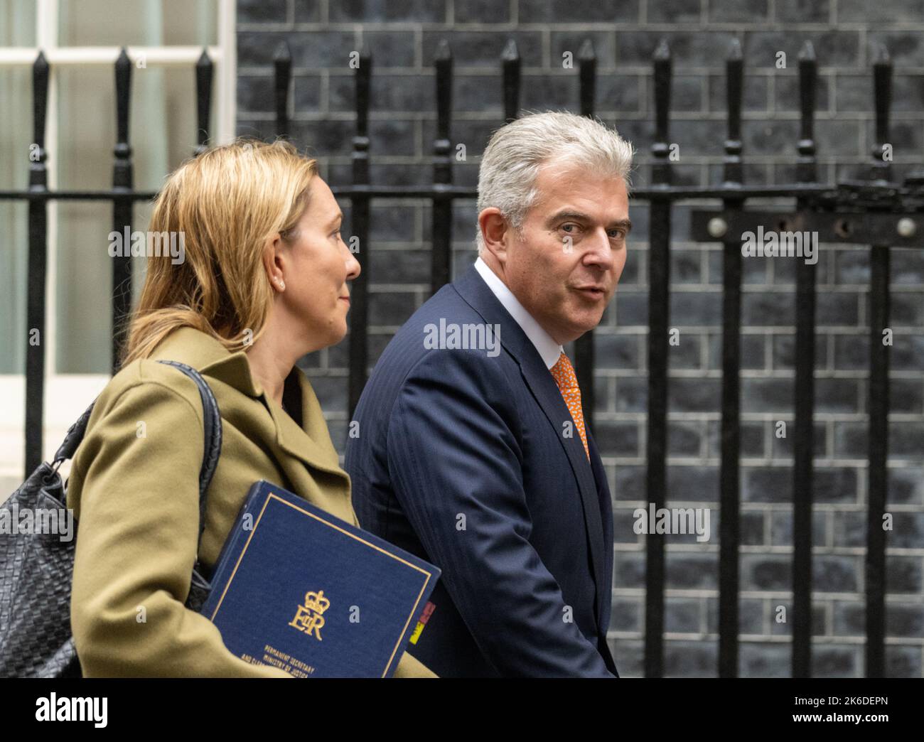 London, UK. 13th Oct, 2022. Brandon Lewis, Lord Chancellor and Secretary of State for Justice, with Antonia Romeo Permanent secretary to the Justice ministry in Downing Street London Credit: Ian Davidson/Alamy Live News Stock Photo