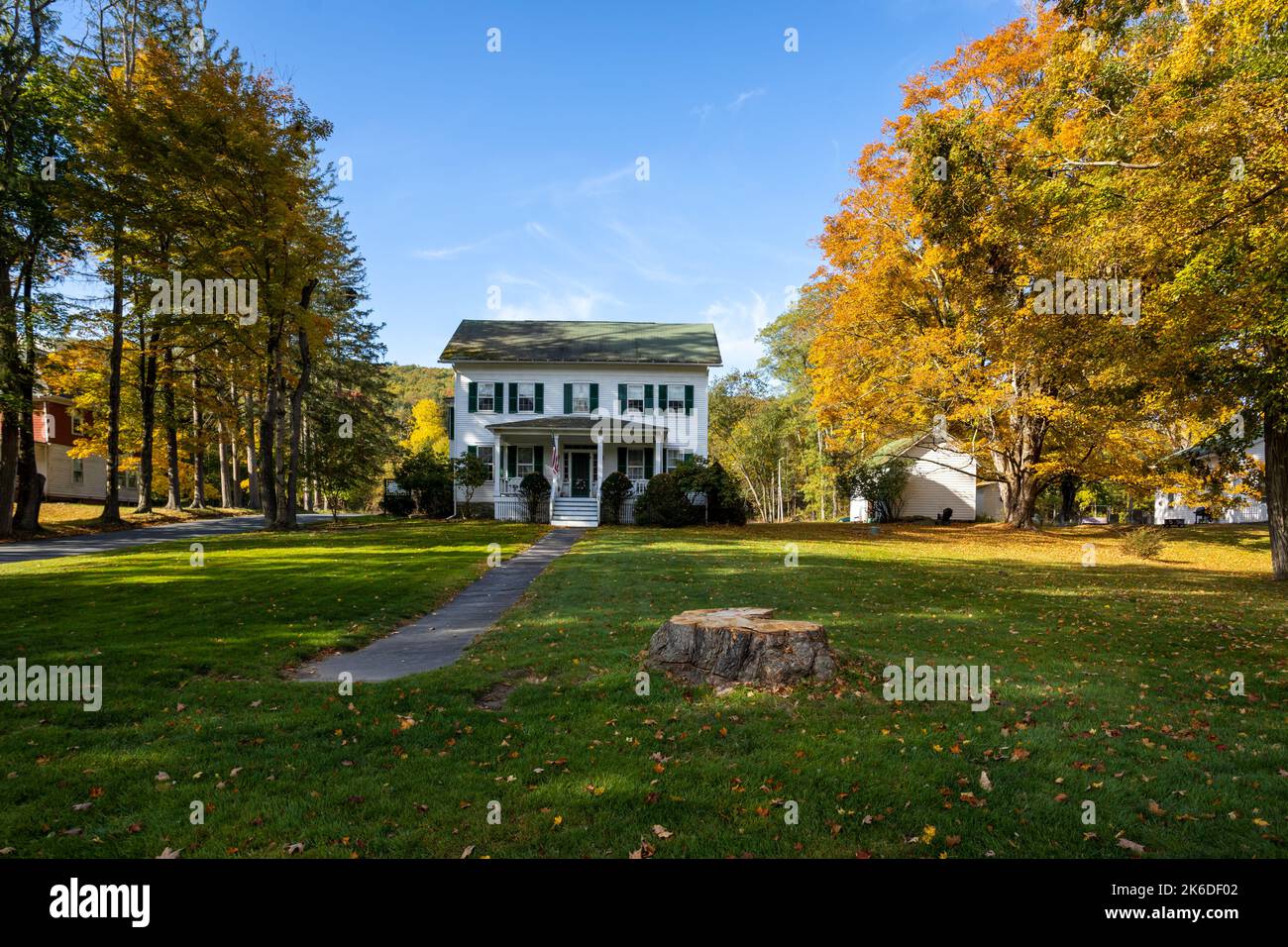 Lackawaxen, PA / USA - October 12, 2022:  1870 Roebling Inn Bed and Breakfast on the Delaware River on a brilliant fall morning Stock Photo