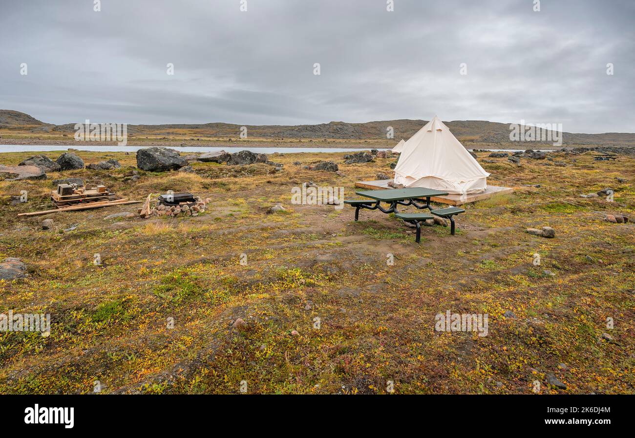 A single tent beside the Sylvia Grinnell River in the Sylvia Grinnell