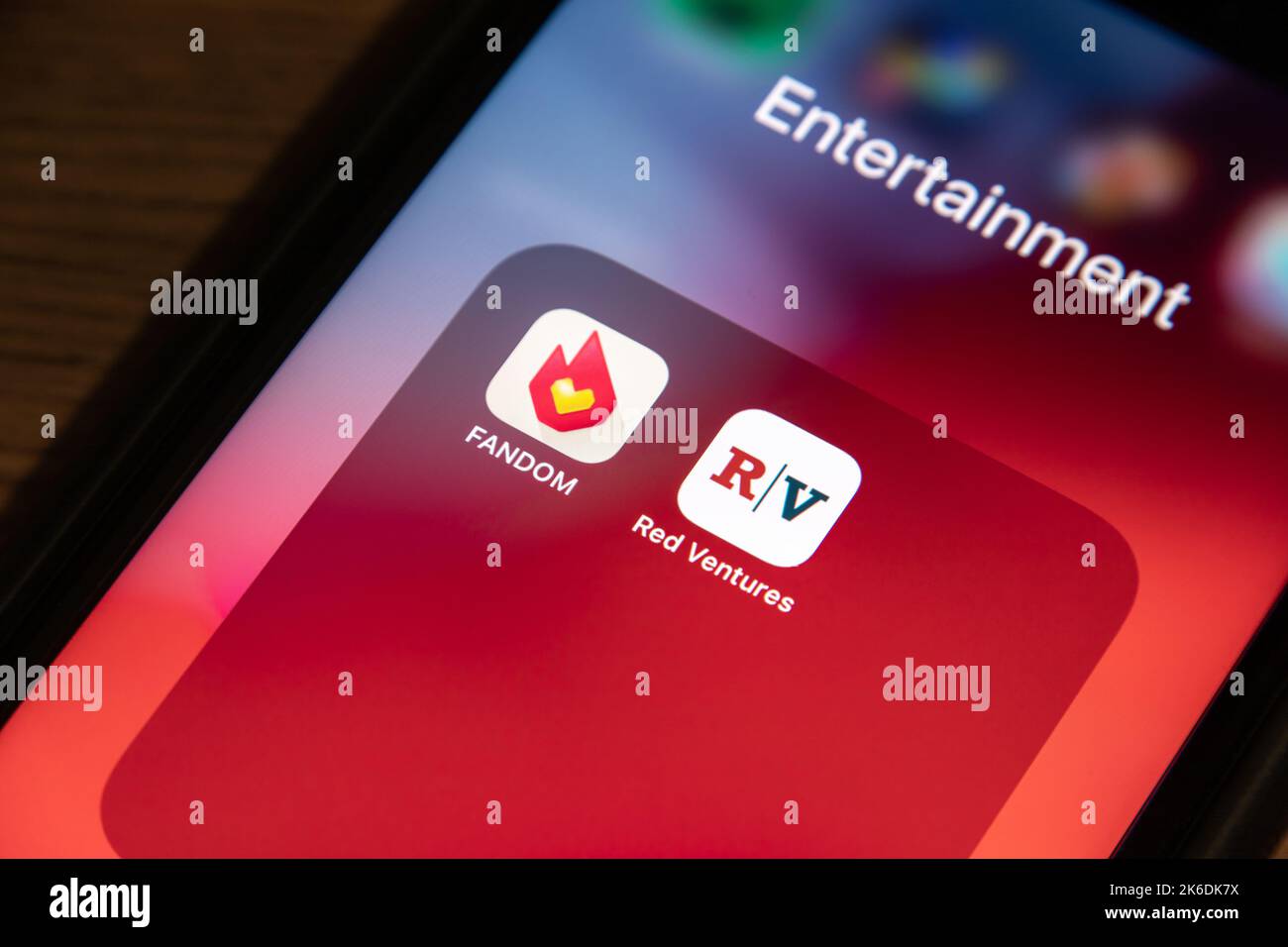 Fandom & Red Ventures on iPhone. Fandom got 7 brands from RV (GameSpot, TV Guide, Giant Bomb, Cord Cutters News, GameFAQs, Metacritic and Comic Vine) Stock Photo