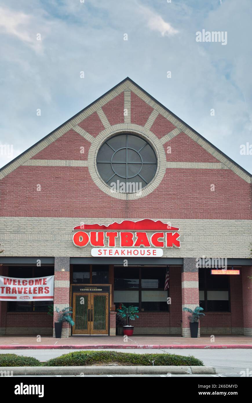 Houston, Texas USA 12-03-2021: Outback Steakhouse storefront and front entrance in Houston TX. Australian themed American restaurant founded in 1988. Stock Photo