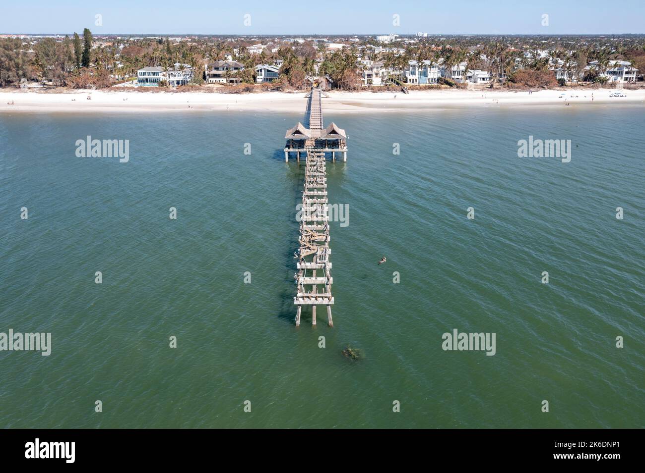Aerial images showing the destruction damage of the Naples Pier Landmark with the end complete missing from Hurricane Ian September  2022 Stock Photo