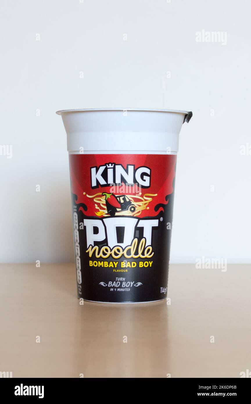 Pot noodle isolated on table Stock Photo