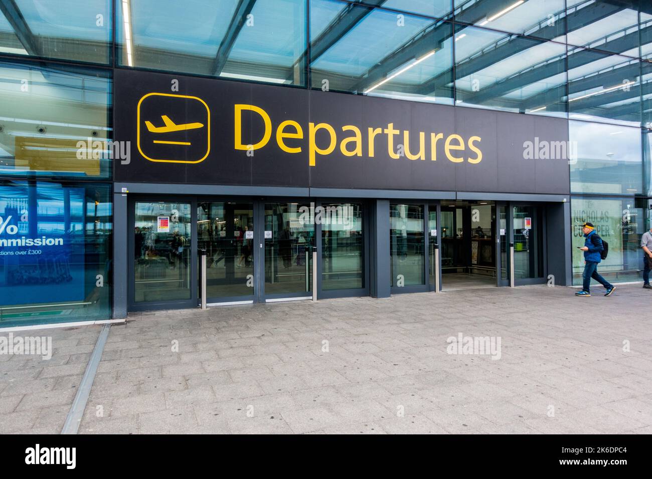 Departures sign board at the entrance of London Gatwick North Terminal Stock Photo