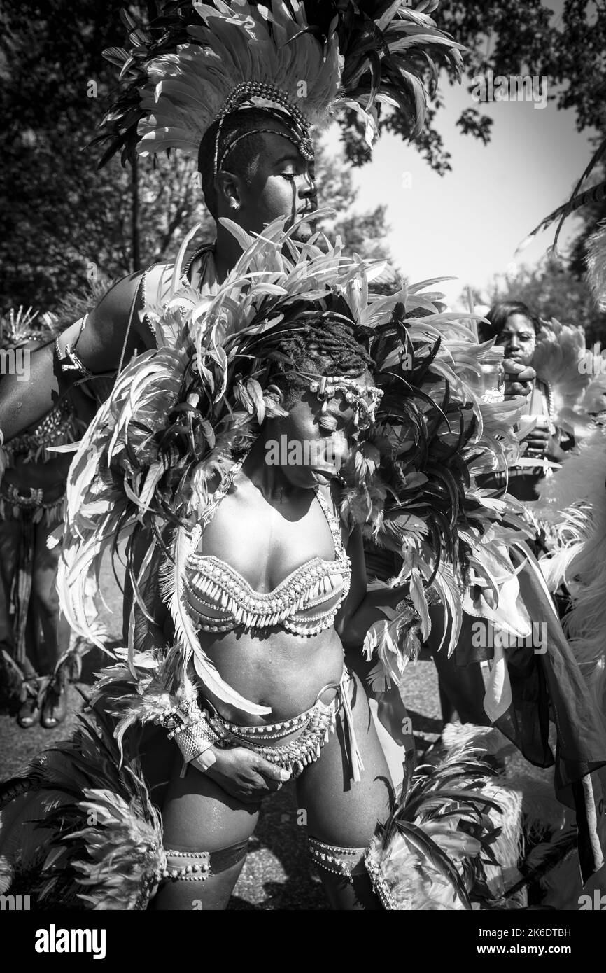 A grayscale shot of people at the Annual West Indian and Caribbean Day Parade and Carnival in Brooklyn Stock Photo
