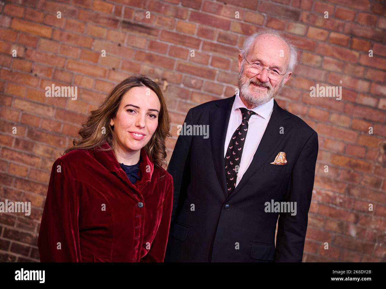 Berlin, Germany. 13th Oct, 2022. Stella Moris and John Shipton, wife and father of Wikileaks founder Julian Assange stand in the Colosseum cinema during the Human Rights Film Festival. The festival begins with the documentary about Julian Assange. Credit: Annette Riedl/dpa/Alamy Live News Stock Photo