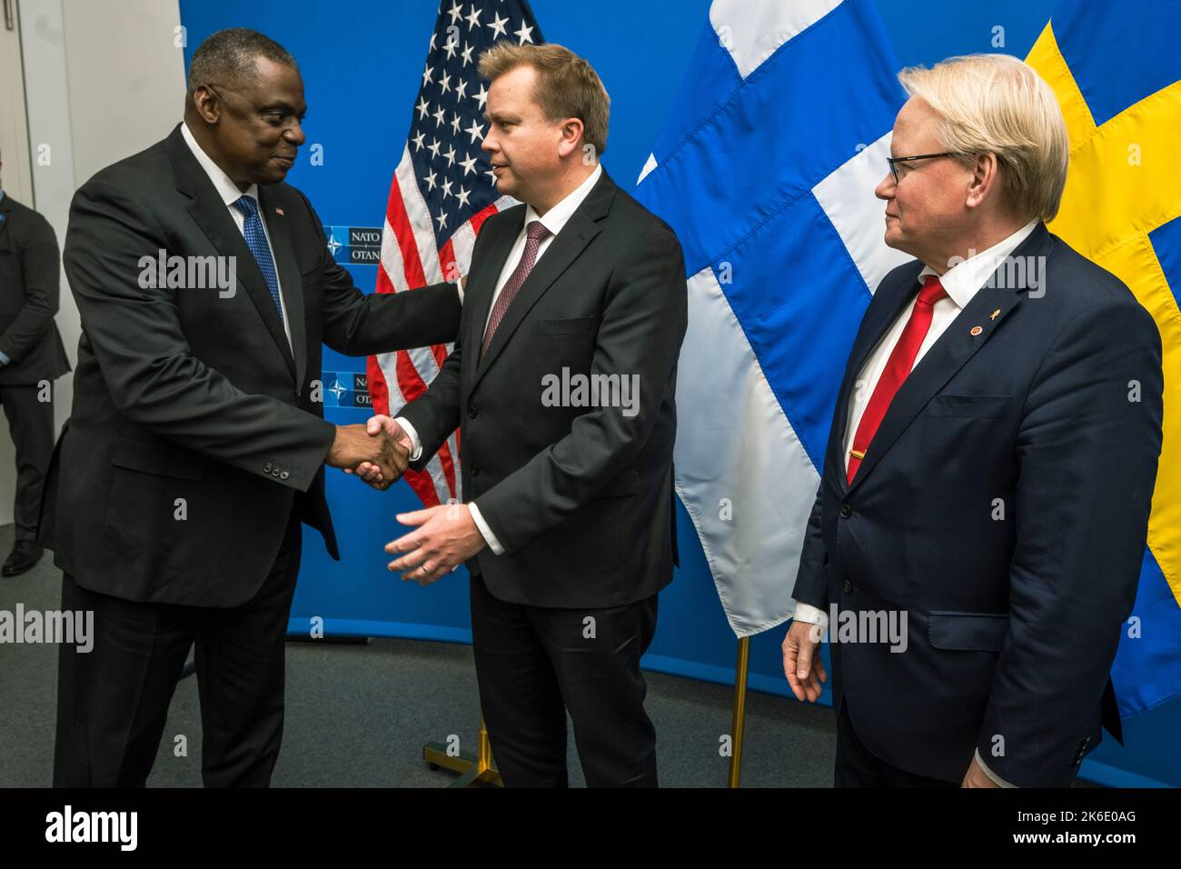 Brussels, Belgium. 13th Oct, 2022. U.S. Secretary of Defense Lloyd J. Austin III, left, greets Finnish Minister of Defence Antti Kaikkonen and Swedish Minister of Defence Peter Hultqvist, right, at the NATO Defense Ministerial, October 13, 2022 in Brussels, Belgium. Credit: Chad J. McNeeley/DOD/Alamy Live News Stock Photo
