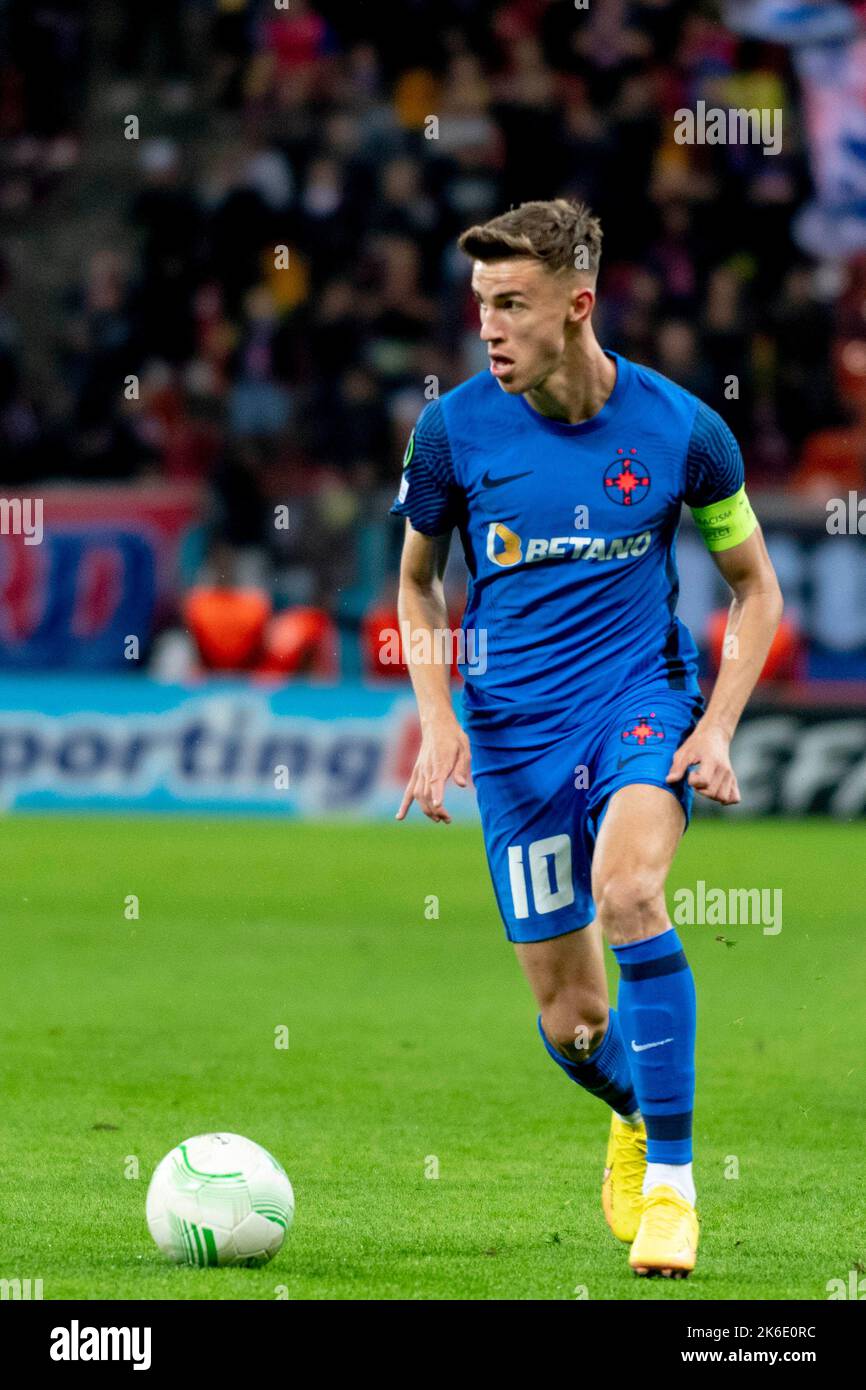 Bucharest, Romania. 13th Oct, 2022. October 13, 2022: Octavian Popescu #10 of FCSB during of the UEFA Europa Conference League group B match between FCSB Bucharest and Silkeborg IF at National Arena Stadium in Bucharest, Romania ROU. Catalin Soare/Cronos Credit: Cronos/Alamy Live News Stock Photo