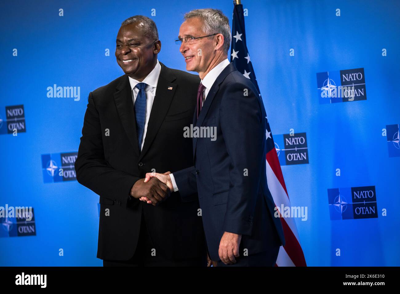 Brussels, Belgium. 13th Oct, 2022. U.S. Secretary of Defense Lloyd J. Austin III, left, shakes hands with NATO Secretary General Jens Stoltenberg on the sidelines of the NATO Defense Ministerial, October 13, 2022 in Brussels, Belgium. Credit: Chad J. McNeeley/DOD/Alamy Live News Stock Photo