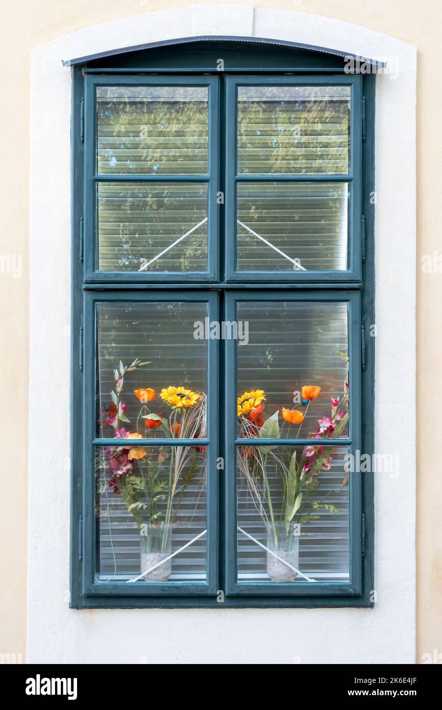 Window of a romantic and colorful house with flower pots Stock Photo ...