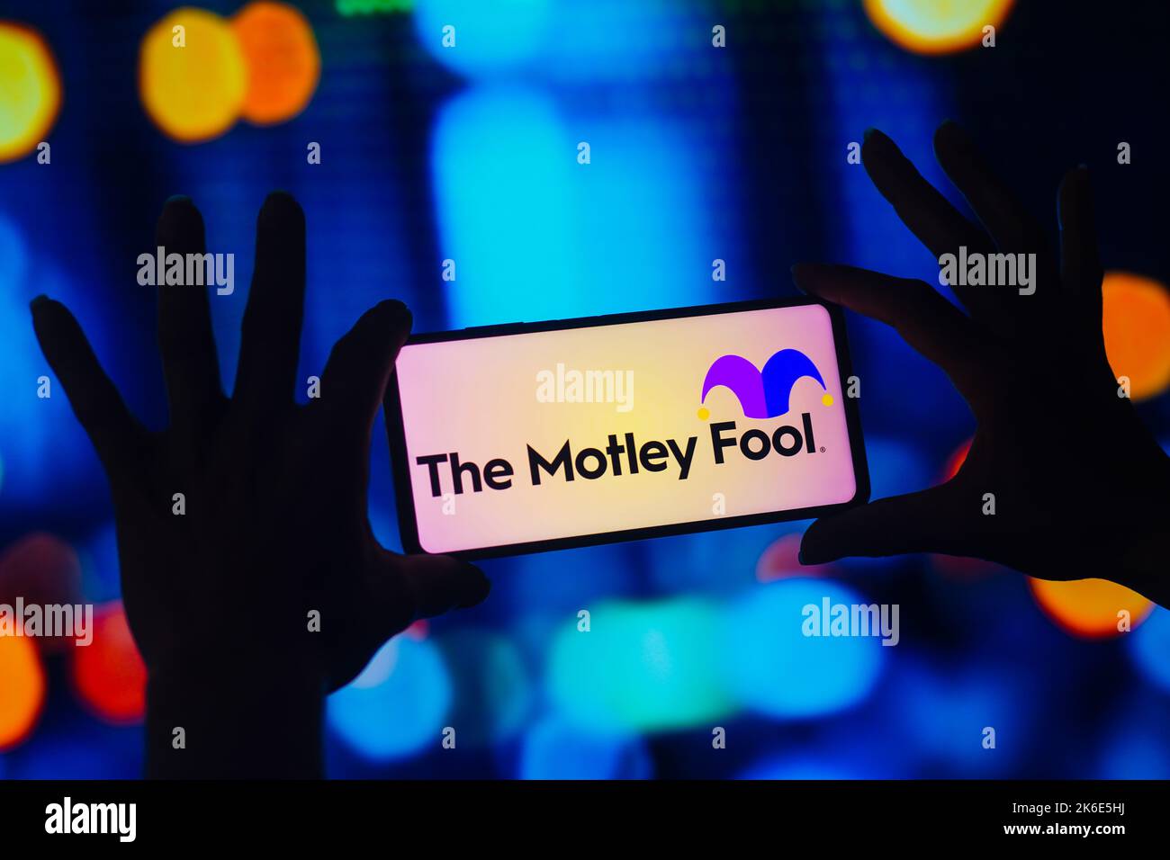 In this photo illustration, The Motley Fool Holdings Inc. logo is displayed on a smartphone screen. Stock Photo