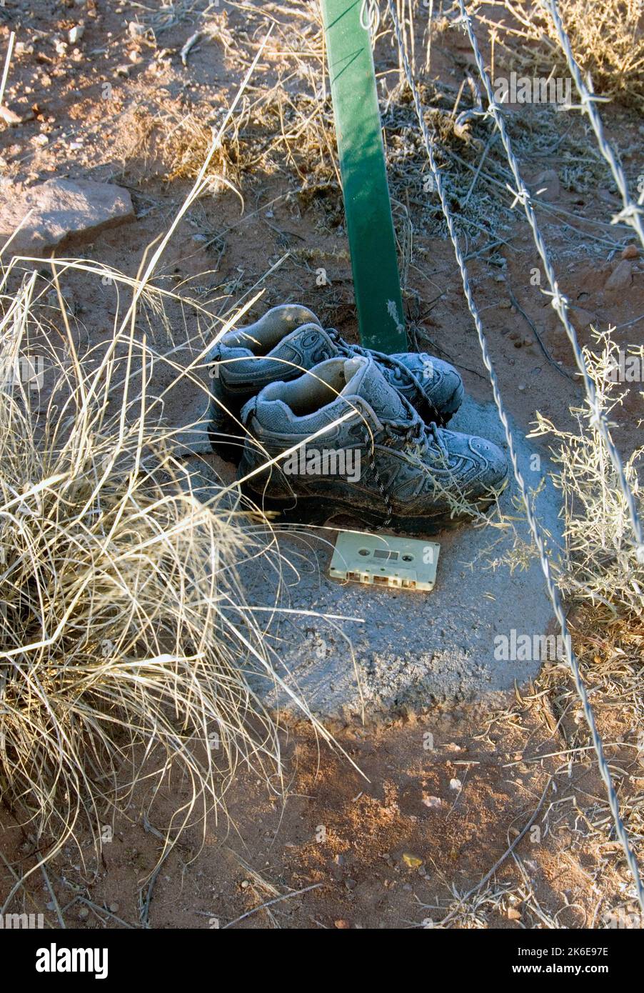 Abandoned boots at the southwest US border in winter. Stock Photo