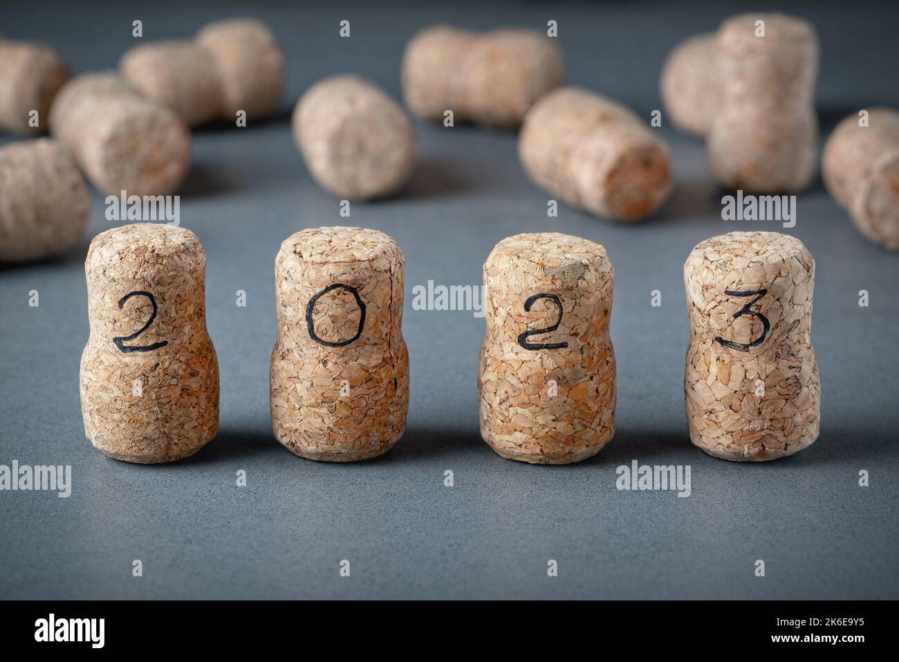 Wine corks with the number 2020 pushed ahead of other corks. Upcoming new year Stock Photo