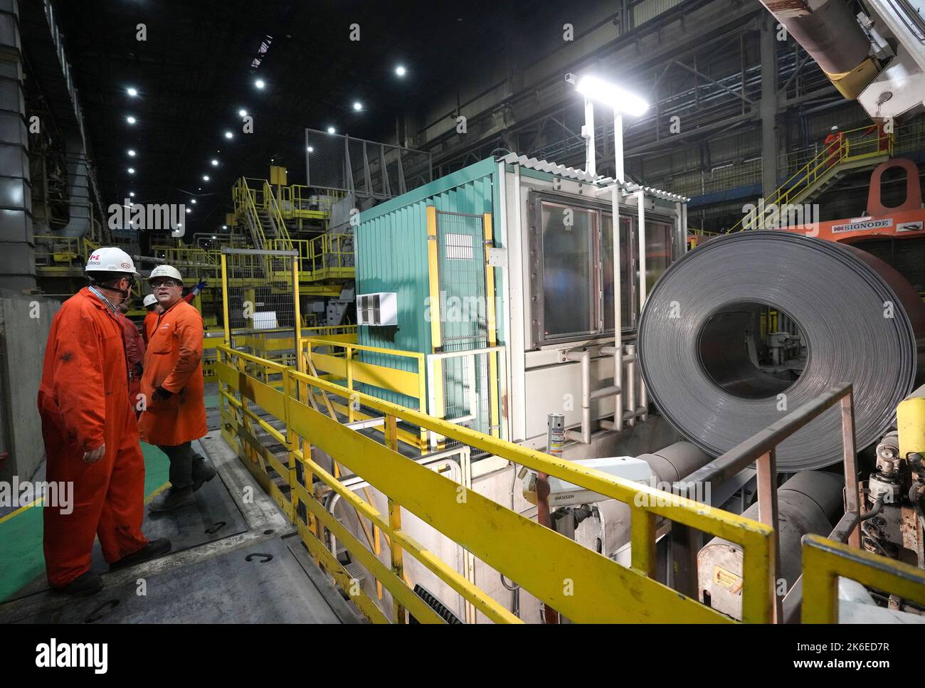 Employees at ArcelorMittal Dofasco, a manufacturer of hot rolled steel
