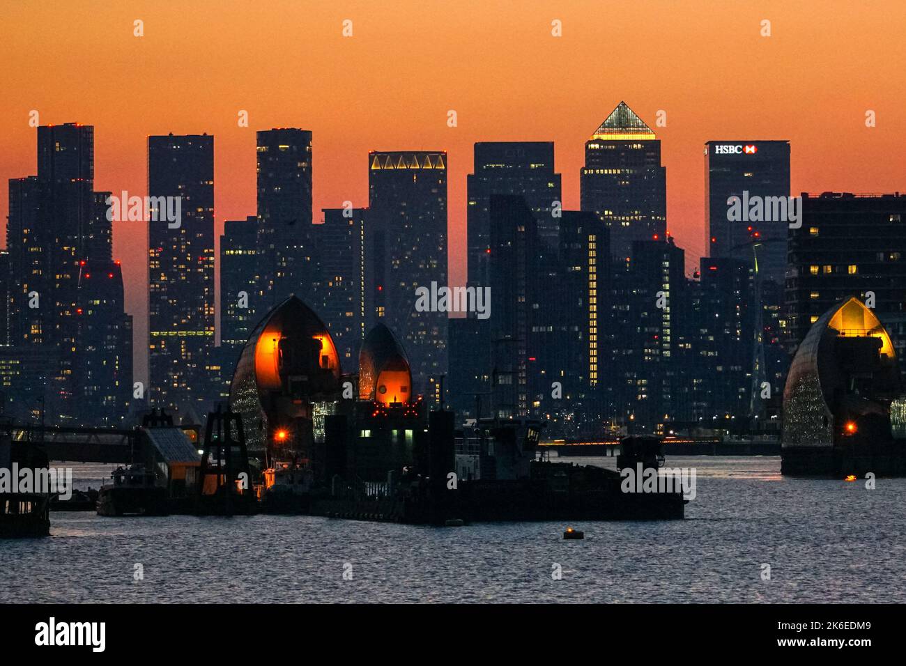 Canary Wharf and Thames Barrier at sunset, London, England, United ...
