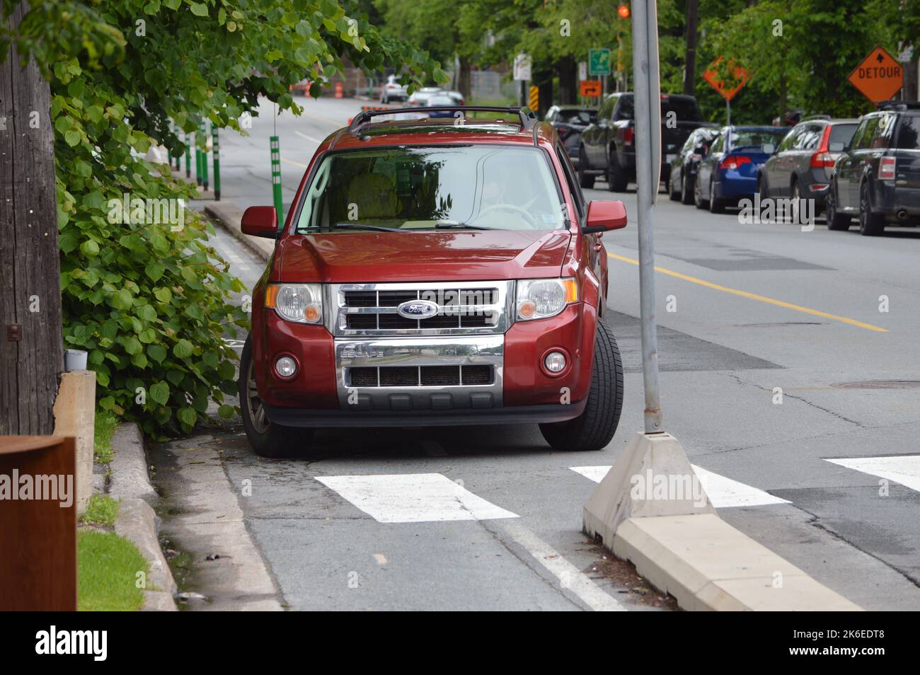 Car parked in South Park Street bike lane in Halifax, Nova Scotia