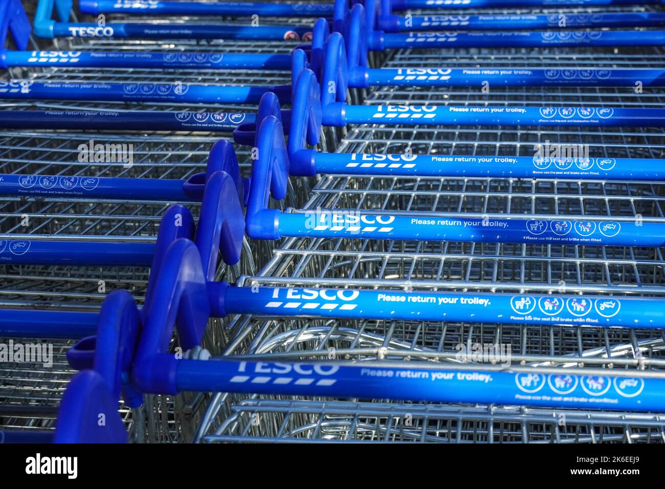 Rows of Tesco trollies lined up outside the supermarket, London, England, United Kingdom, UK Stock Photo