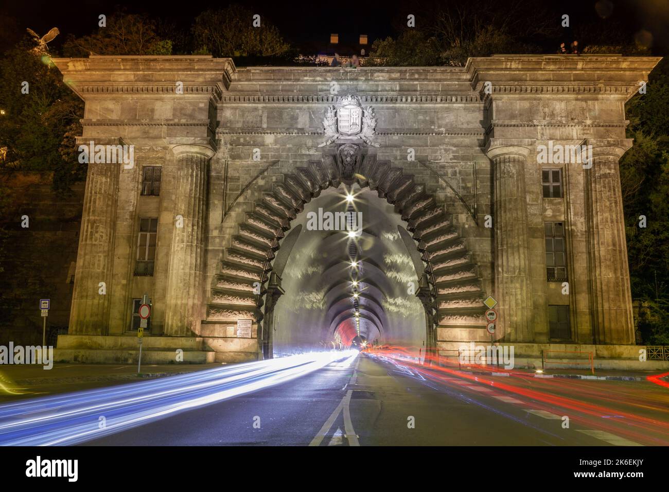 Buda Castle Tunnel at night with car movement trail blurred, Budapest, Hungary Stock Photo