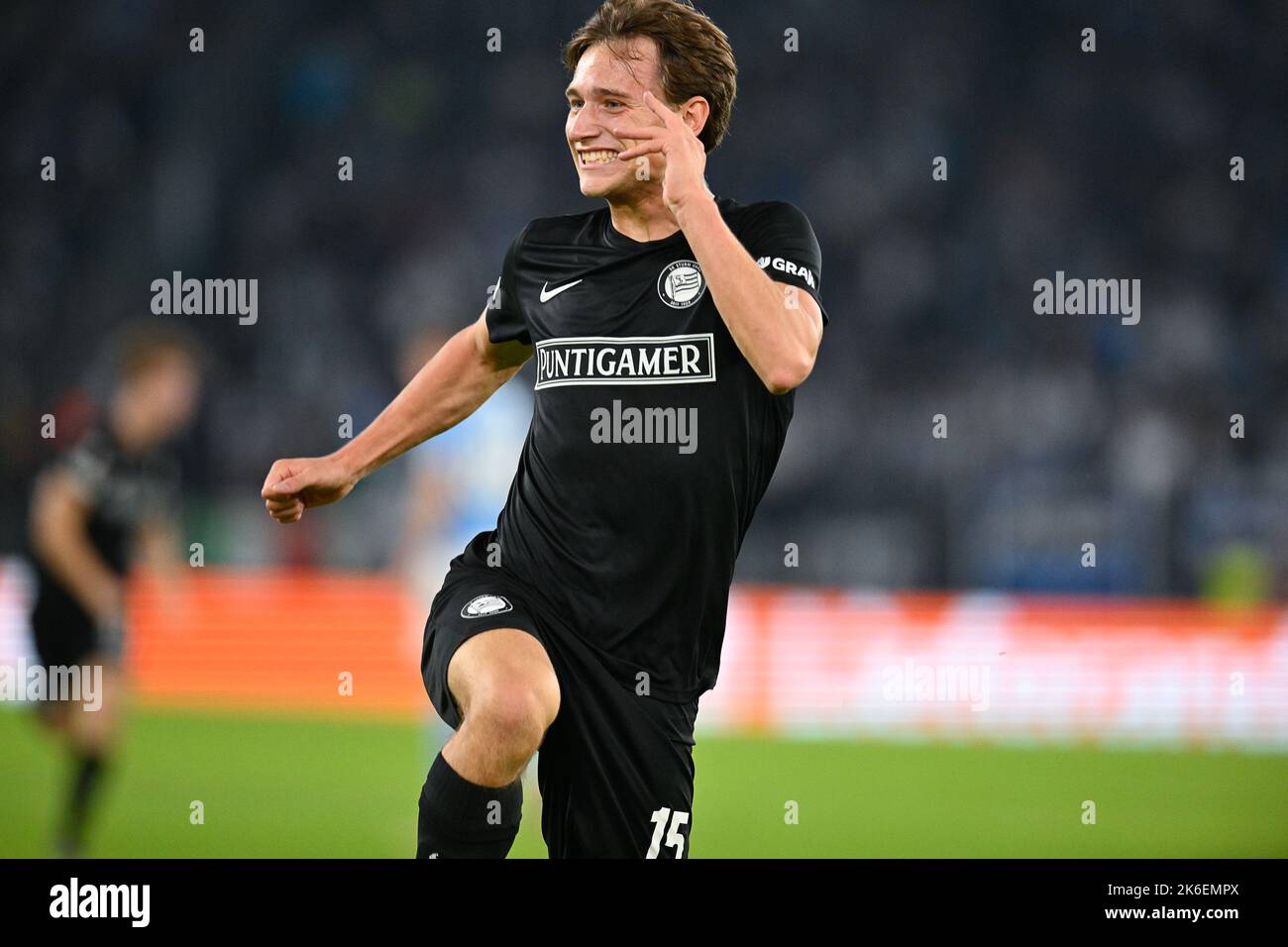 Italy, 13 October 2022, William Boving of Sturm Graz jubilates after scoring the goal 11 in the