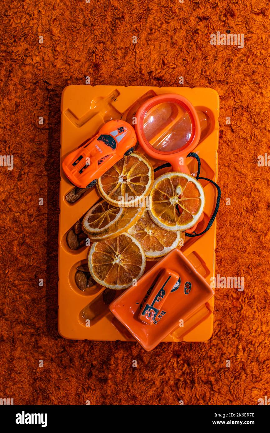 Mandarin orange segments on the plate with orange isolated Stock Photo